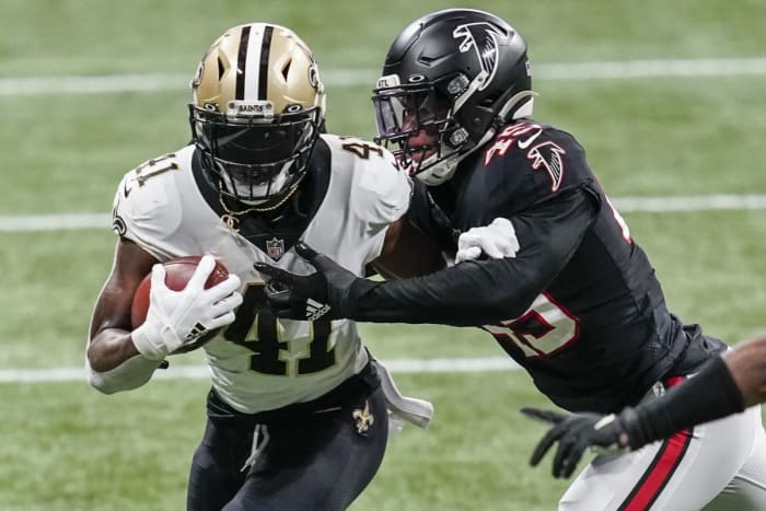 New Orleans Saints running back Alvin Kamara (41) is tackled by Atlanta linebacker Deion Jones (45). Mandatory Credit: Dale Zanine-USA TODAY